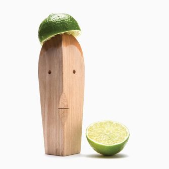 Citrus reamer made of wood for juicing manually